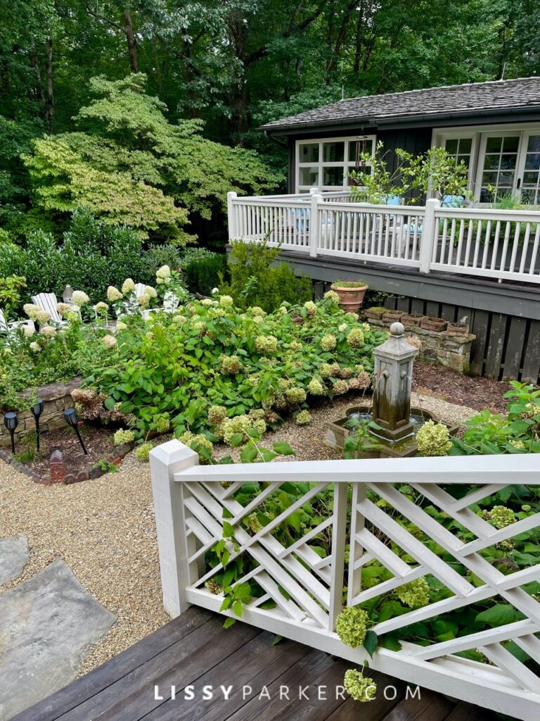 Greenhouse and gravel patio