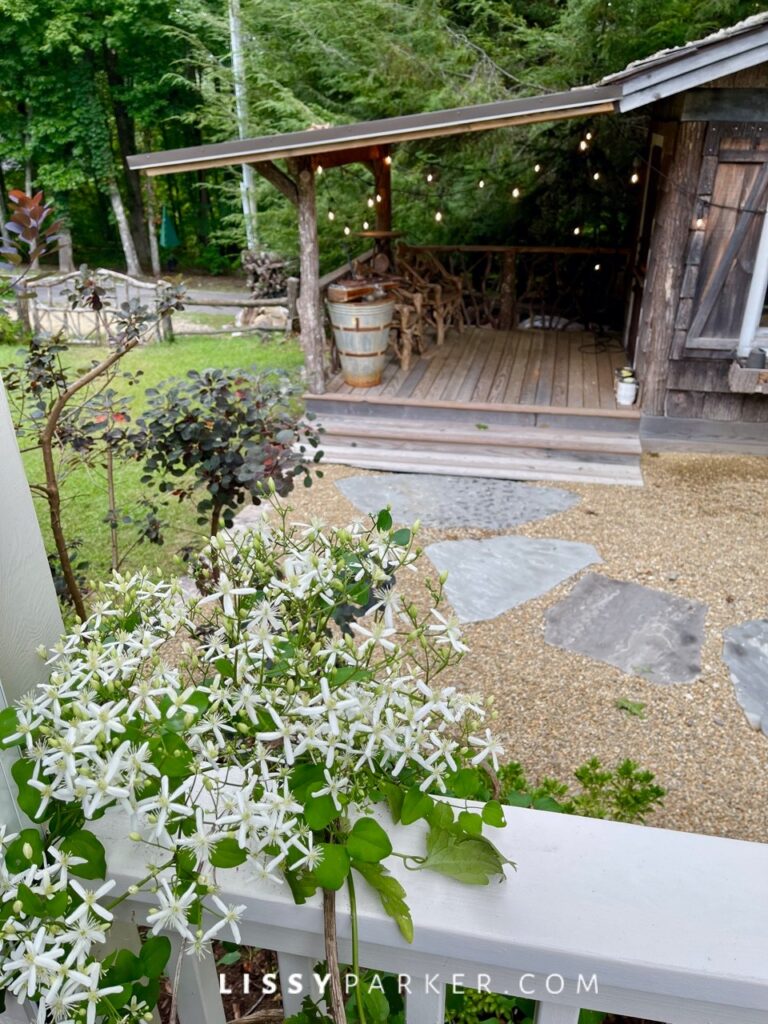 Greenhouse and gravel patio