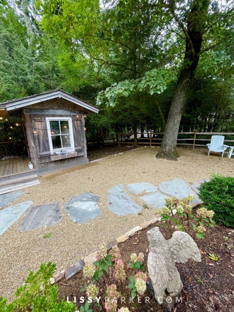 Greenhouse and gravel patio